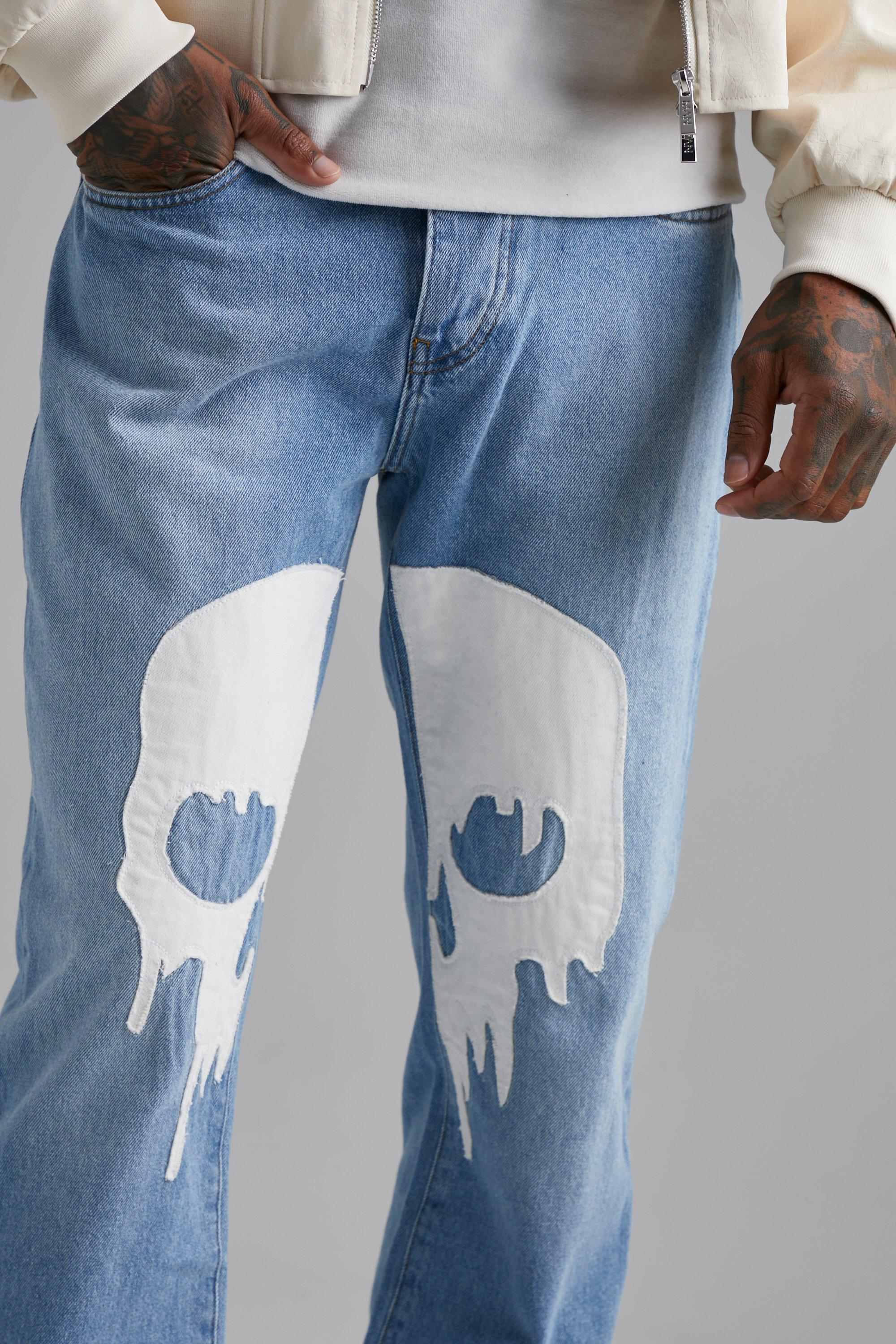 Jeans dritti con applique di teschio